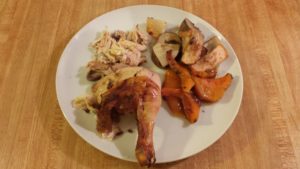 whole roasted chicken and potatoes, butternut squash, onions, and apples