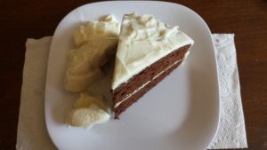 Chocolate cake with cream cheese frosting is perfect with ice cream.