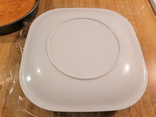 Place Plate on Top of Pan, Plastic Side Down