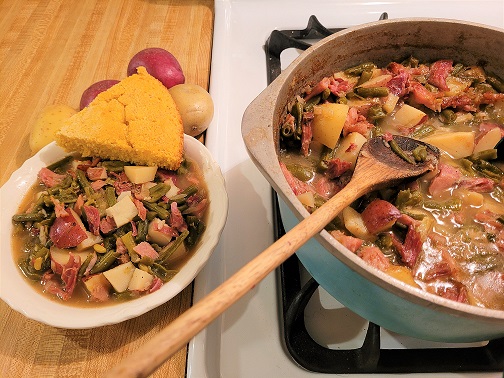 Ham with Green Beans and Potatoes on the Stove Top